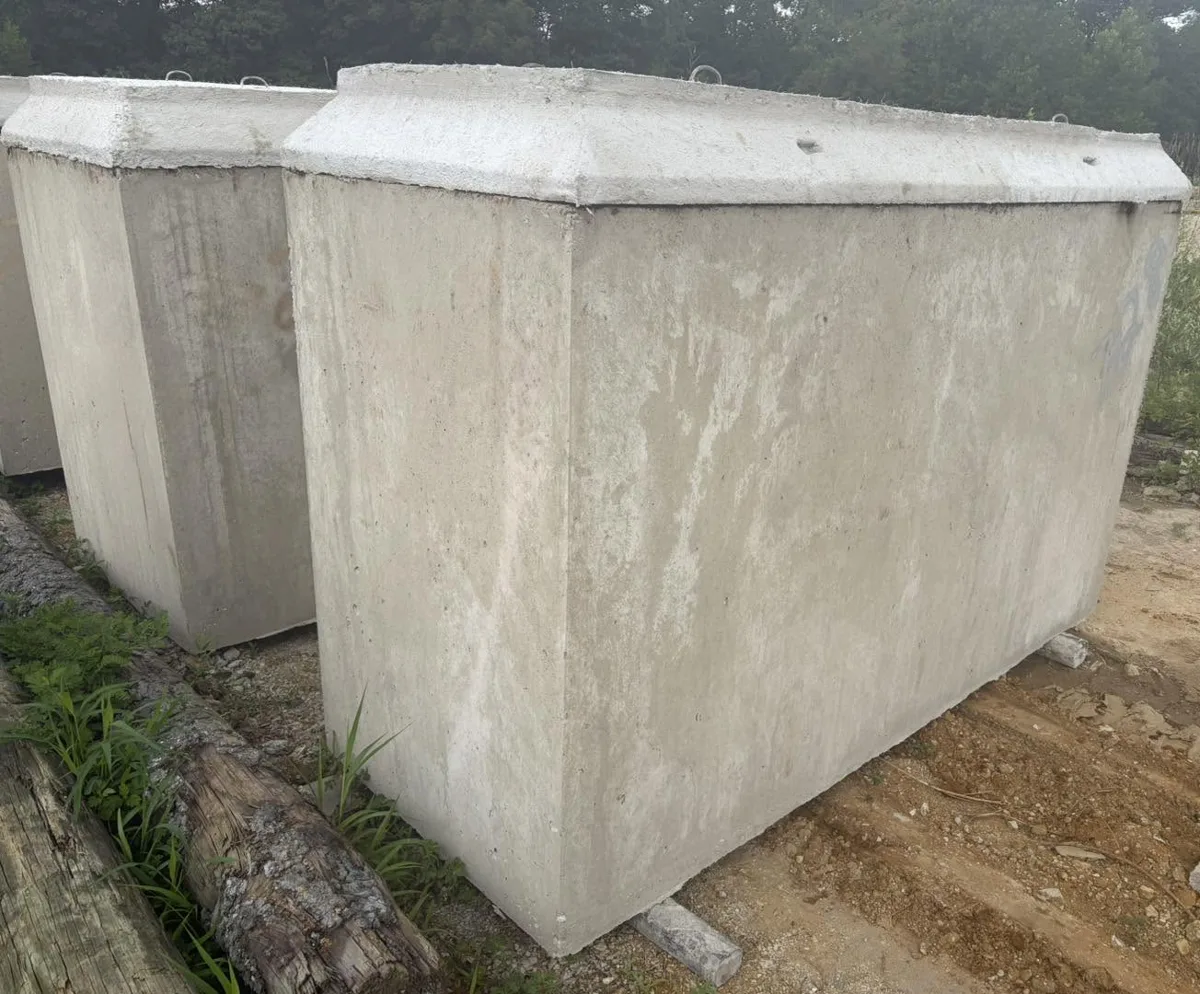 Precast concrete lawn crypts curing in the yard at Bradbury Vault Company